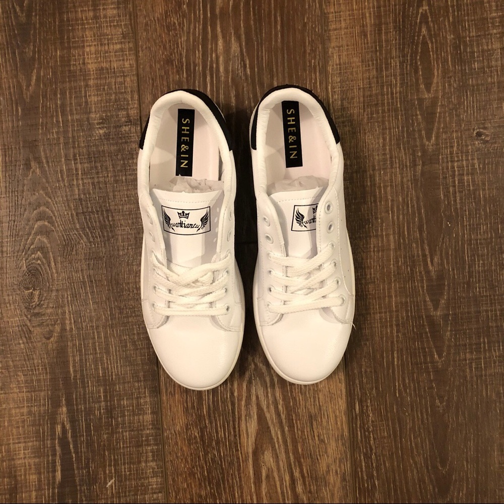 White sneakers with black details